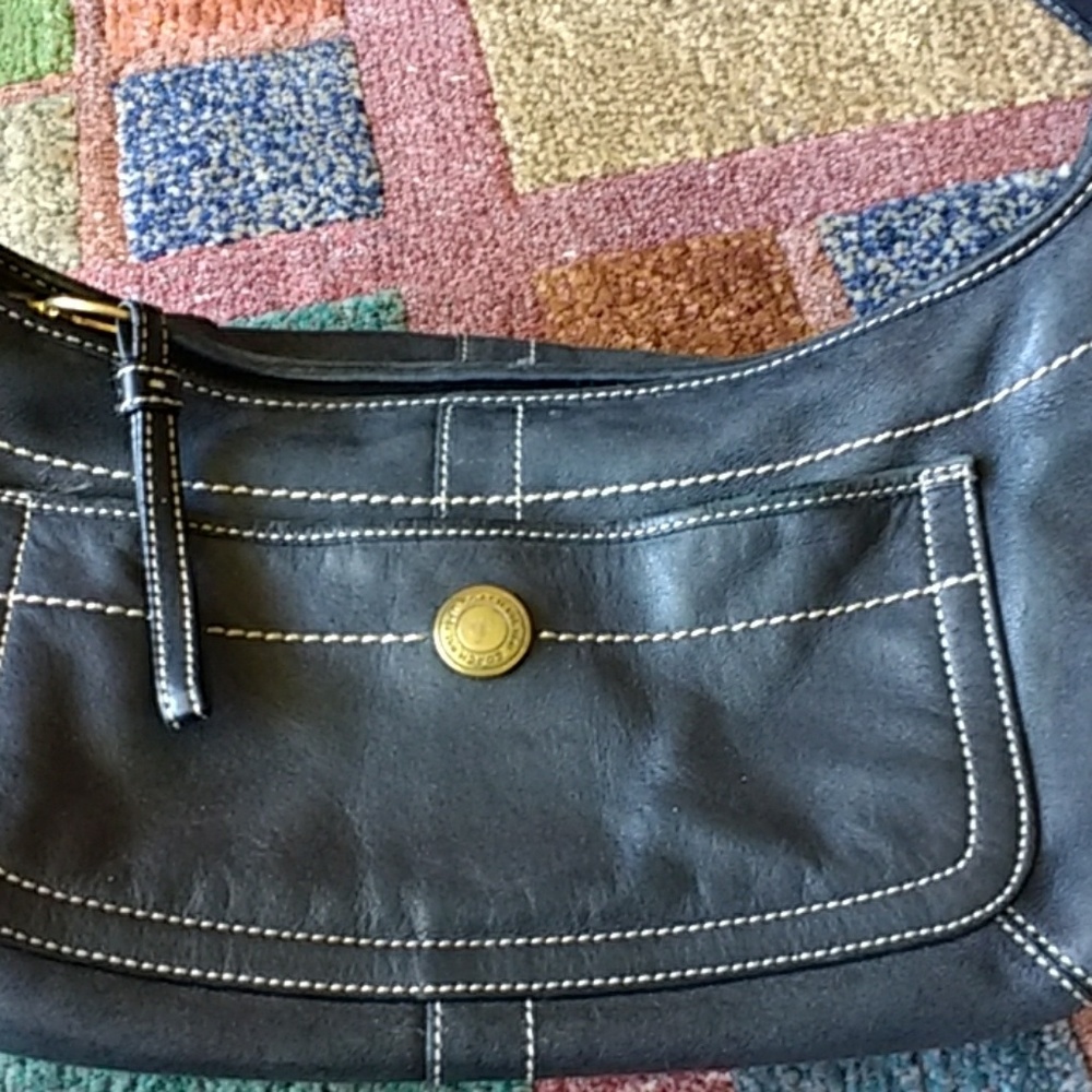 👜